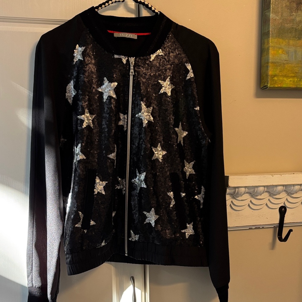 Tuzzi luxury German brand. M